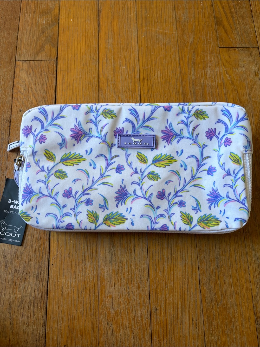 SCOUT Floral Travel Pouch in White with Purple and Yellow Accents DOG LOGO